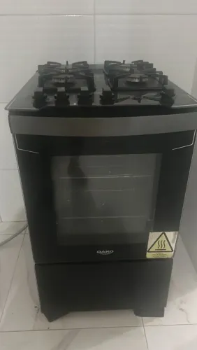 Fogão daku 4 bocas e forno funciona tudo