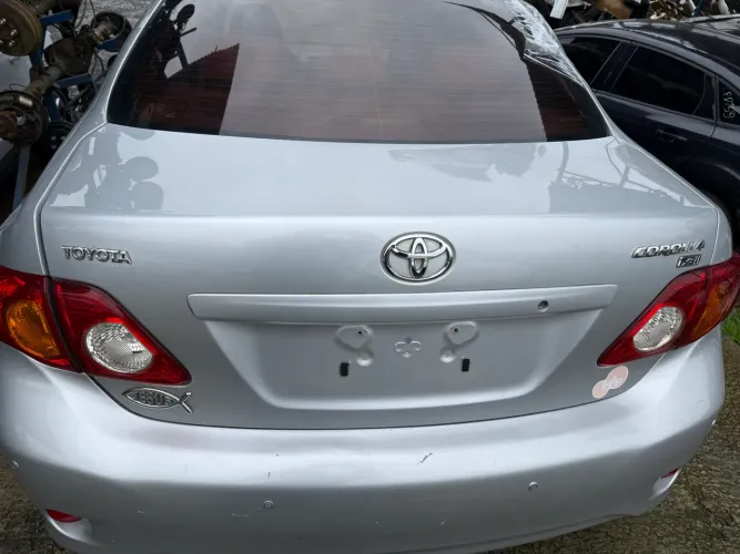Tampa Traseira Toyota Corolla 2010 - Rs Auto Peças