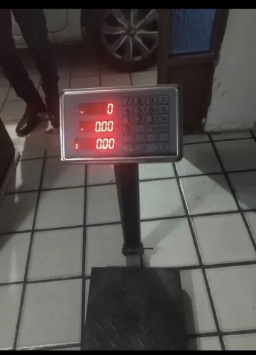 Balança plataforma com defeito