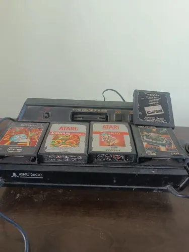 Atari 2600 Com 4 fitas funcionando perfeitamente.