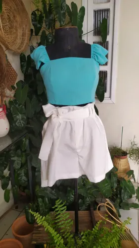 Look completo short Tam G e cropped Tam m