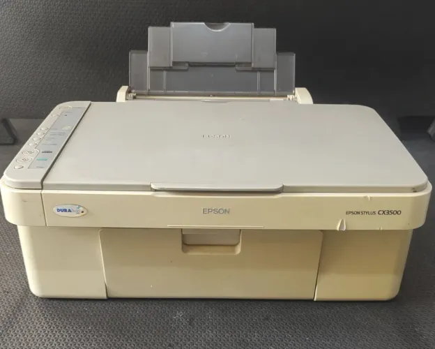Impressora Multifuncional Epson Stylus CX6500 - Liga, mas está sujeito a defeito.