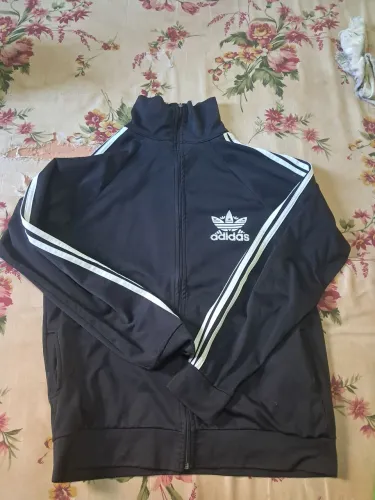 Blusa GG adidas Original usada super conservada