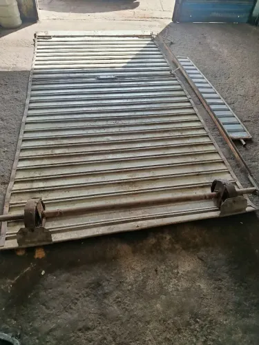 Porta em aço de enrolar Alt 2.80 X 1.50 Larg.