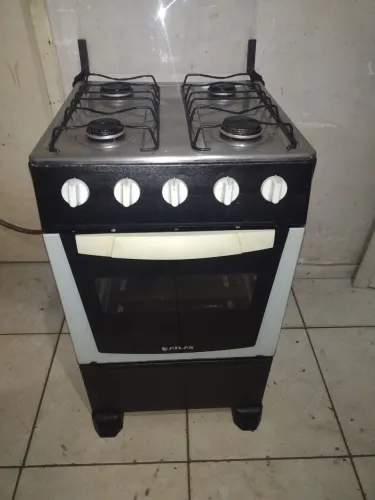 Fogão atlas 4 bocas tampo inox semi novo pra hj temos entrega não e elétrico aceito cart