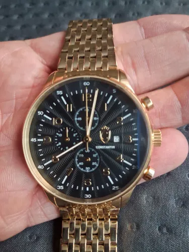 relogio constantim dourado