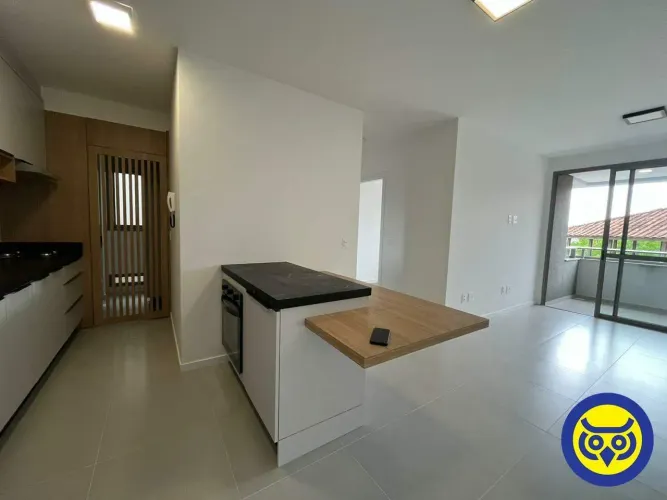 Apartamento novo para locação no Cacupé 2 dormitórios, suíte, vista para o mar e 1 vaga