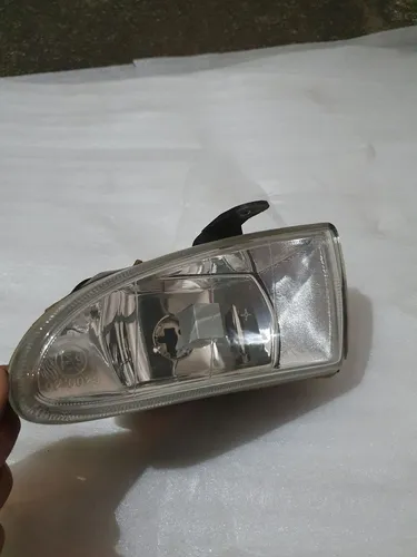 Fiesta courier farol milha novo original 