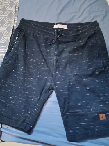 Bermudas menino vesti um 10 anos