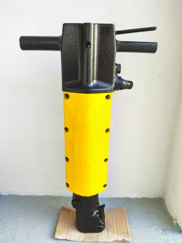 Rompedor pneumático Atlas Copco TEX 32PS, equipamento profissional de alta resistência.