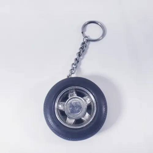 Antigo chaveiro roda de carro