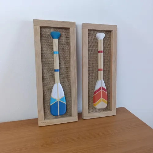 Par de quadros decorativos com remos estilo praia