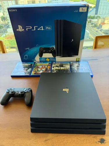 PLAYSTATION 4 PRO 1TB SONY - COMPLETO COM CAIXA ORIGINAL + 4 JOGOS