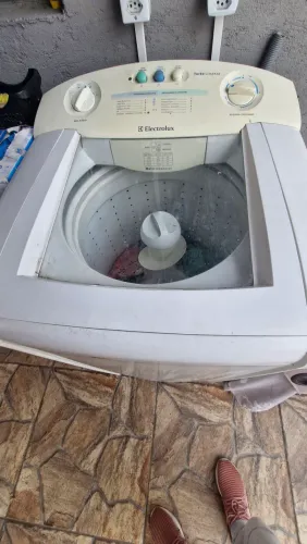 Máquina de lavar com defeito 
