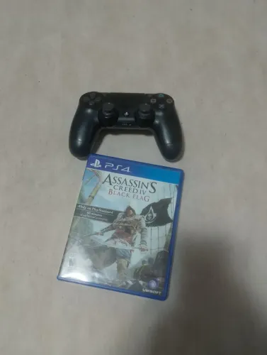 Vendo controle de PS4 usado jogo assassin's Creed Black flag