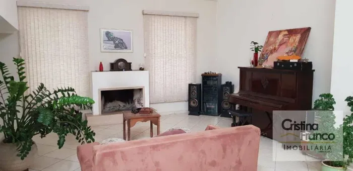 Casa com 4 dormitórios à venda, 370 m² por R$ 1.850.000,00 - Condomínio Campos de Santo An