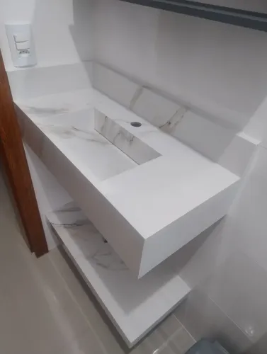 Lavatório esculpido em porcelanato sob medidas 
