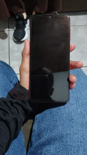 Vendo celular galaxi a12 cor vermelha 400,0 128gb saude da bateria 87:  98: n aceito troca