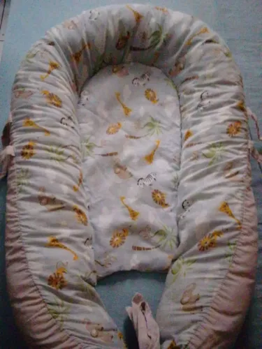 Travesseiro anatômico e ninho de bebê 