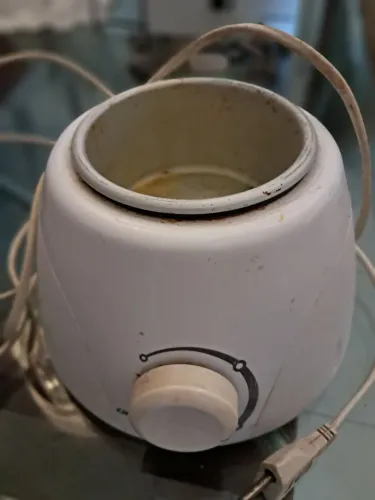 Esquentadoe de cera elétrico