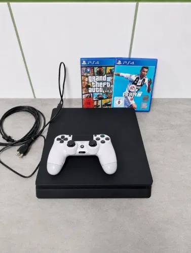 PS4 slim com 1 controle, 2 jogos - 1 TB de memória.