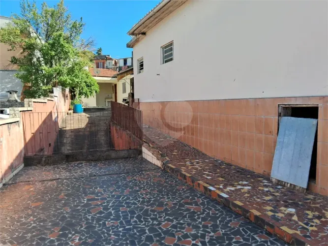Casa em terreno de 350m² com segunda Casa e 5 Vagas de Garagem - Oportunidade Única!