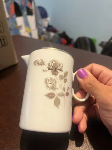 Leiteira porcelana renner 