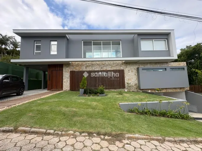 Casa em condomínio fechado com 4 suítes para vender ou alugar. 431m² - Rio Tavares - Flori