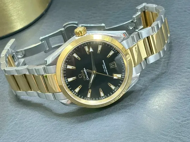 relógio omega automatico seamaster gold steel mostrador preto