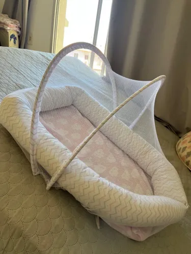 Ninho com mosquiteiro