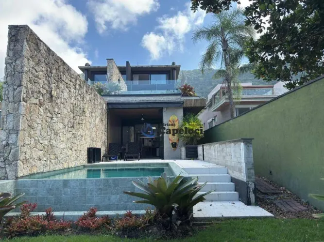 Casa com piscina e 5 dormitórios à venda, 240 m² por R$ 9.300.000 - Juquehy - São Sebastiã
