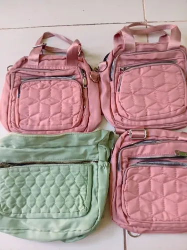 4 bolsas novas porém com avaria