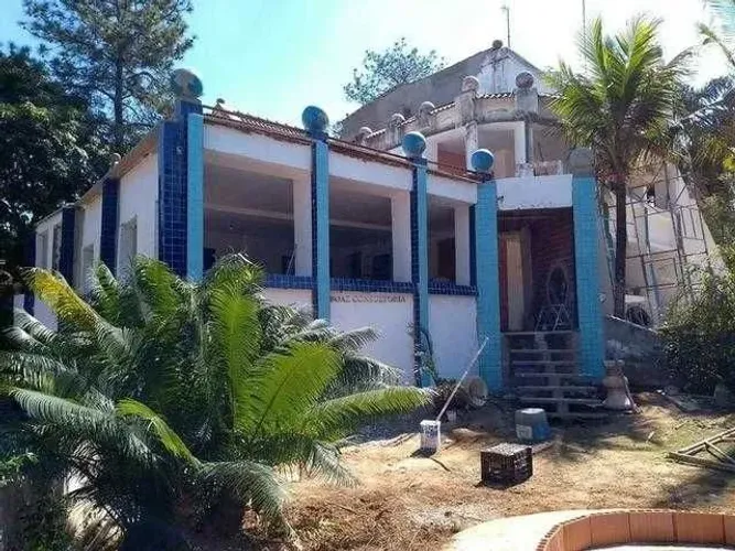 Sítio Comercial 60.000m² com Múltiplas Edificações e Cachoeira no Perímetro Urba