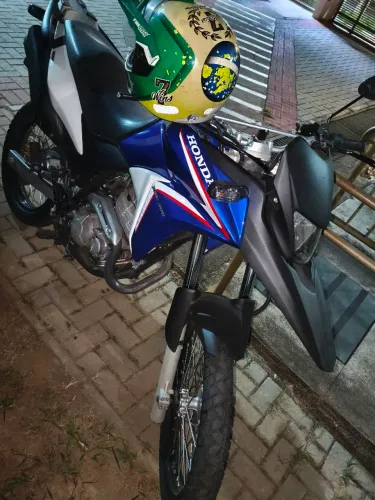 XRE 2014 bem conservada vendo ou troco já e vela fina.