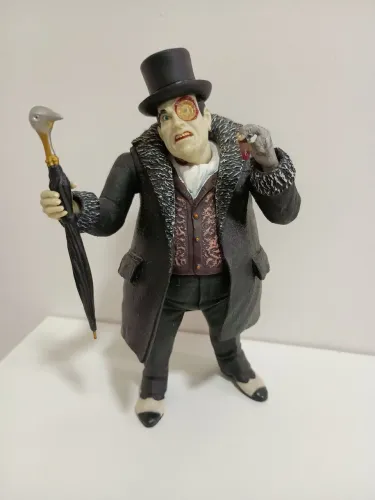 Pinguim (Penguin) da linha DC Collectibles baseada no jogo Batman: Arkham City. Raro