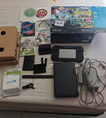 Videogame Wii u deluxe 3/ 32gb+ hd com jogos+ jogos originais por 999,00