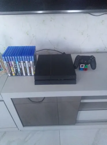 Vídeo game ps4 pouco usado com 13 jogos