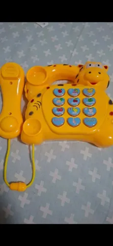 Telefone musical infantil 