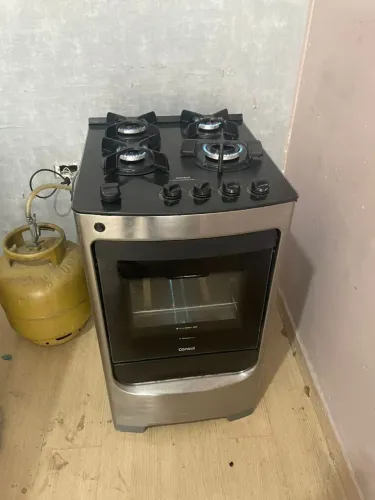 Fogão Consul inox com tampo de vidro automático