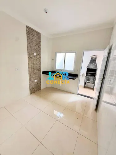 Village com 2 dormitórios à venda, 60 m² por R$ 370.000,00 - Tude Bastos - Praia Grande/SP