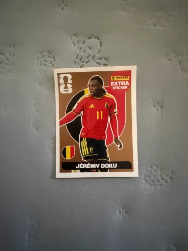 Figurinha Extra Sticker Bronze Panini - Jérémy Doku (Bélgica) - Copa do Mundo FIFA 2026