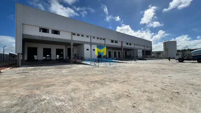 Alugue galpão NOVO em condomínio com 1.376m² 3 docas e rampa, em Prazeres as margens BR-10