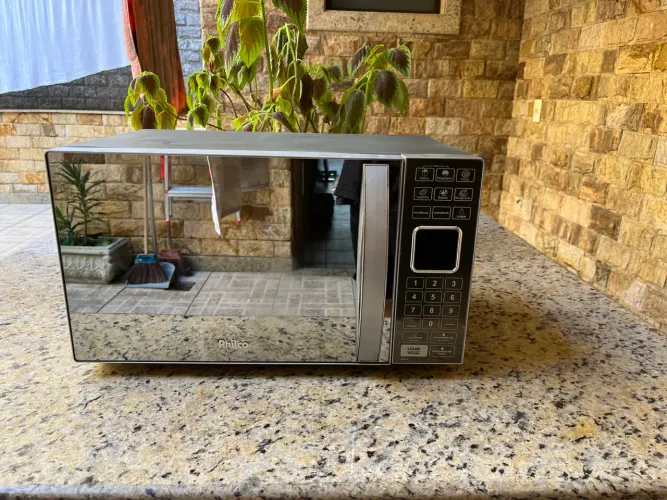 MICROONDAS PHILCO ESPELHADO COELHO NETO 25L FUNCIONANDO PERFEITAMENTE TUDO 300,00