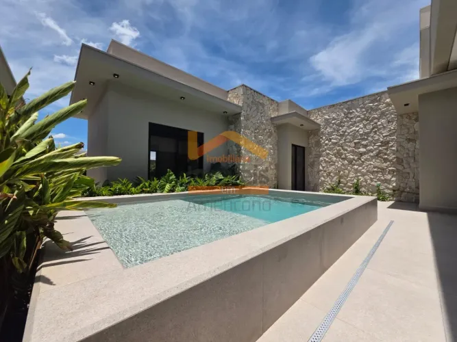Casa de alto padrão em condomínio fechado com 3 suítes e 242m² em Americana-SP