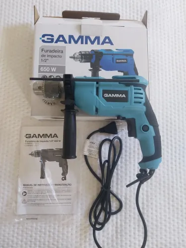 Furadeira e parafusadeira de impacto 127v 650w 13mm marca GAMMA nova sem uso 