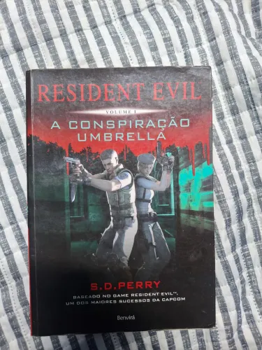 Resident Evil- A conspiração umbrella. Vol -1 Livro em ótimo estado de conservação