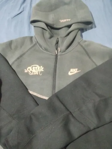 Casaco da NIKE+SINA WORLD nunca usado-novo
