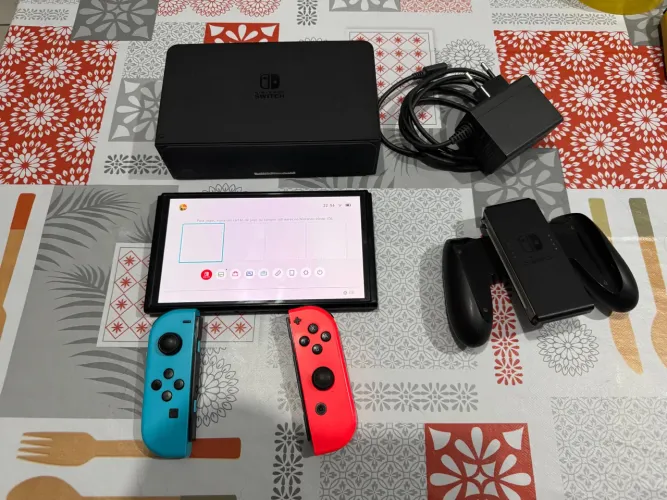 Nintendo switch oled bloqueado + mario kart físico 