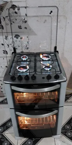 Lindo moderno fogão eletroux top de 2 forno com superchama automático com luminária