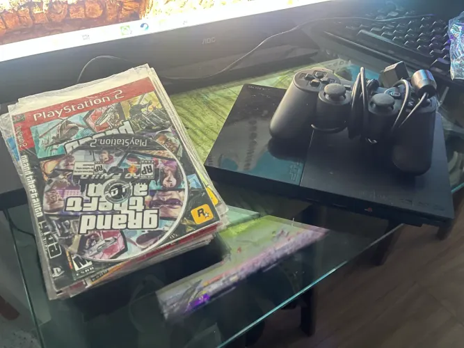 Ps2 + 5 jogos + manete - ótimo estado